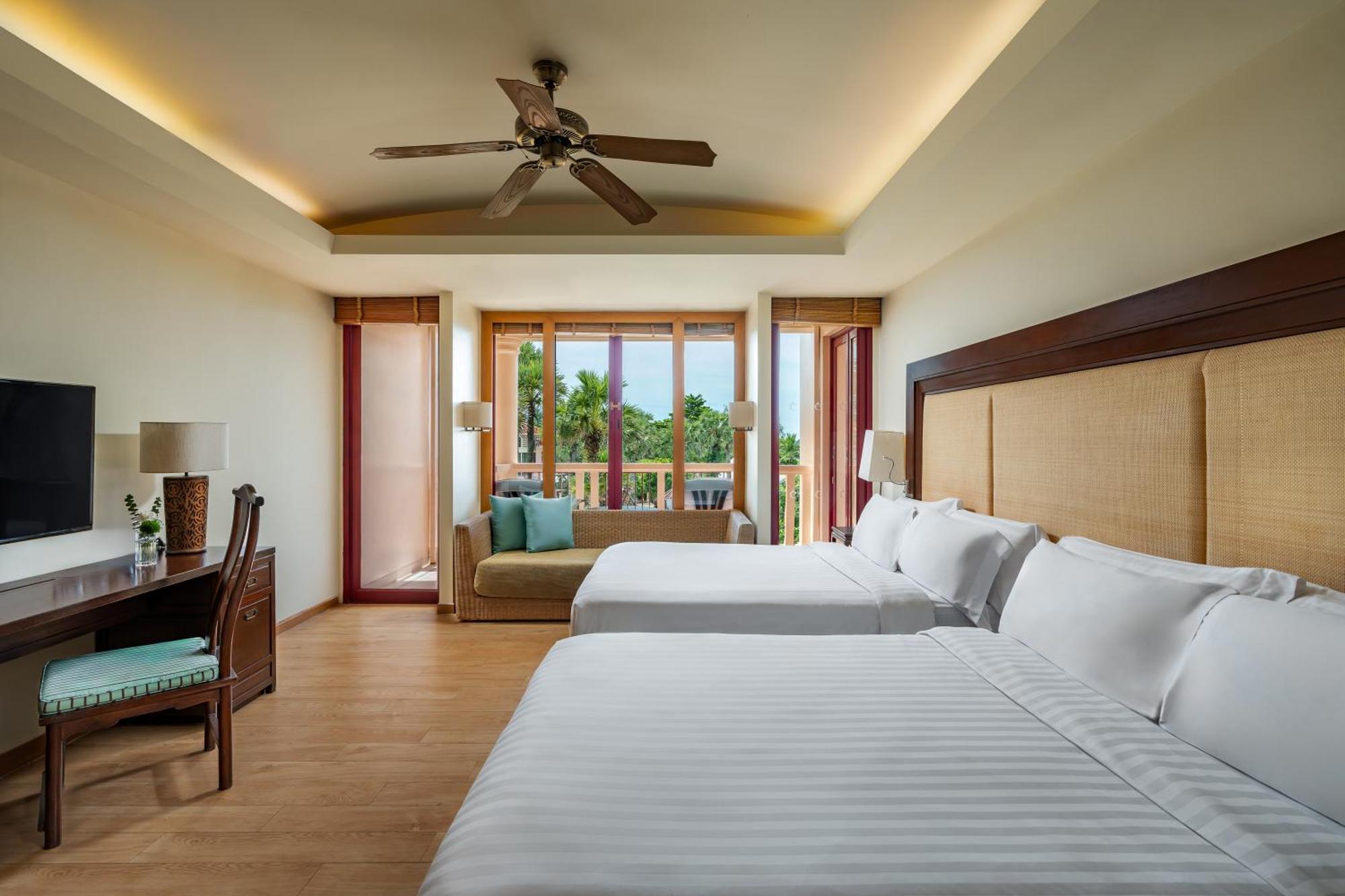 Quarto Deluxe com 2 Camas de Casal e Vista do Mar
